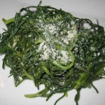Baby broccoli with peperoncini, lemon and garlic