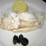 Wild striped bass with cauliflower, black garlic and yellow panna cotta