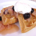 Gluten-free waffle with white nectarine & blueberry compote, and Grand Marnier Chantilly cream