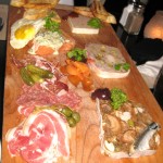 King platter: cured meat and sausage selection with cornichons and pickled onions