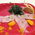 Sashimi garden salad; halibut sashimi sprinkled in green tea sea salt and lemon