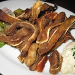 Pig ear "chicharon" with radish salad and lime