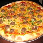 Moroccan spiced lamb and manchego cheese pizza with Ras el hanout
