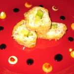 Pop art crab; snow crab, avocado, asparagus decorated with Kenny's custom sauce art