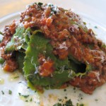Green summer pasta with veal meat tomato sauce