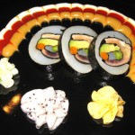 Dragon's eye; squid wrapped with tuna, yellowtail, halibut, salmon, avocado and asparagus