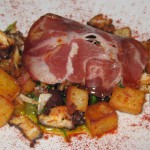 Octopus salad with potato, parsley-celery salad, coquilles olives, Lomo ham, lemon oil and paprika