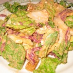 The Famous Original Spinning Bowl Salad: romaine and iceberg lettuce, baby spinach, shredded beets, chopped eggs and croutons, tossed with exclusive Vintage Dressing