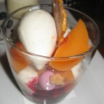 Peaches Melba with blackberry meringue and frozen yogurt