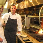Executive chef Sven Mede with Sophie Gayot by the rotisserie
