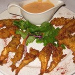Dancing crabfingers served with spicy chili dipping sauce
