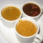 Trio of soups: chicken and andouille gumbo; leek, shiitake mushroom and sun-dried tomato champagne cream soup; and cheeseburger soup