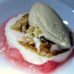 Pink grapefruit suprêmes gratinées with praline ice cream and biscotti crumble