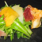 Spanish salad with mizuna lettuce, serrano ham, manchengo, garlic prawns and persimmons with sherry vinaigrette