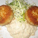 Crab cakes with rémoulade, frisée and herb salad