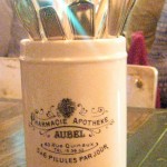 The silverware are presented on the table in a mug