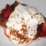 Spiced pound cake with sautéed strawberries, whipped crème fraiche and gingersnap crumble