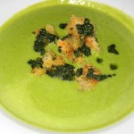 Sweet pea soup with walnut pesto croutons