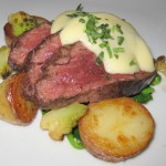 Hanger steak with pea tendrils and romanesco