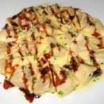 Duck and foie gras ravioli in a Marsala reduction