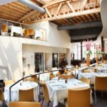 The understated yet dramatic dining room of mk restaurant will be the perfect setting for President Obama's fundraiser