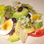 Crab Louie with little gems, tomatoes, eggs and russian dressing