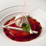 Rhubarb terrine with a strawberry consommé, meringue and ice cream
