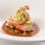 Ruby red shrimp with curry meringue, hearts of palm and lime in a coconut jus