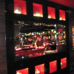 Cooks hard at work in the kitchen at L'Atelier de Joël Robuchon