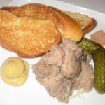 Duck confit rillettes with pickles and toast