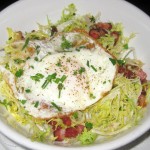 Frisée aux lardons: frisée, lardons, fried egg and sherry vinaigrette