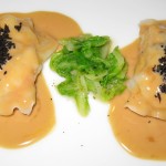 Langoustine ravioli with green cabbage, truffles, foie gras sauce