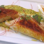 Mediterranean chicken samosa with cilantro, Greek yogurt, bell peppers, scallions and Harissa olive oil