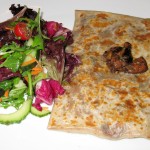 Sautéed cèpes mushroom crêpes with garlic and parsley