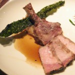 Twice cooked natural pork chop: peck seasoning, honey roasted applesauce, natural pork jus and crispy cavalo nero