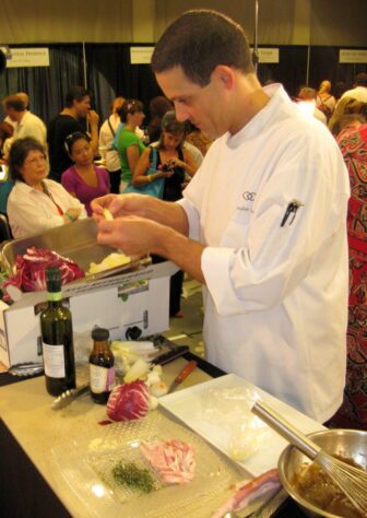 Winning sous chef Alexandre Derenne preparing his salad