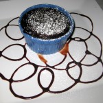 Warm melting chocolate fondant: à la mode with vanilla ice cream