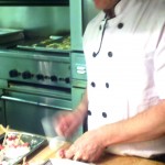 Chef Finkelstein preparing musk ox quaq