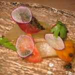 Heirloom melon and onion salad: tomato, hazelnuts and basil