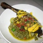 Seco de pato: duck leg confit, black beer sauce and cilantro rice
