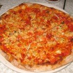 Chicken sausage pizza with tomato, fennel and Fontina