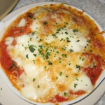 Spaghetti squash casserole with fresh mozzarella, organic tomato and zucchini