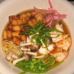 Spicy shrimp and Asian noodles with shaved vegetable, mushroom, tofu and savory broth
