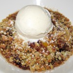 Market fruit cobbler with muffin streusel and vanilla ice cream