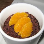 Orange cream panna cotta with blood orange and dark chocolate crumble