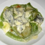 Duck mousse-filled agnolotti, crispy duck skin and butter glaze