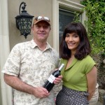 Alain Gayot receives a bottle of Mt. Brave 2008 Cabernet Sauvignon from Julia Jackson