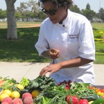 Nyesha Arrington selecting her produce