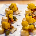 Pan-fried barramundi with saffron-infused cauliflower, fondant potatoes, capers and sultana grapes
