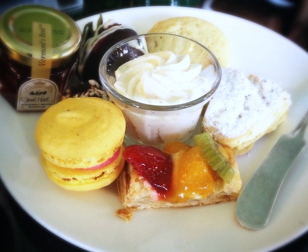 Sweet treats like macarons and tarts are also served